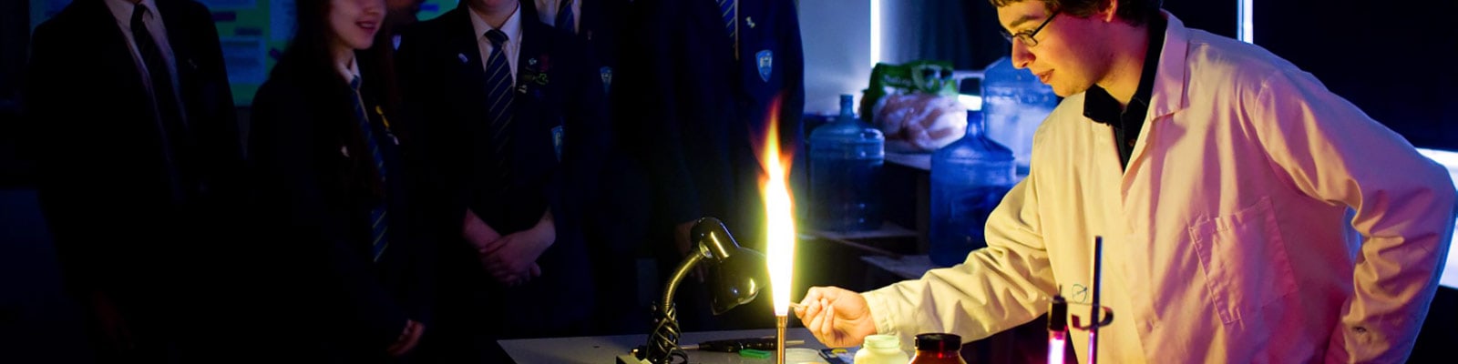 A student with a bunsen burner